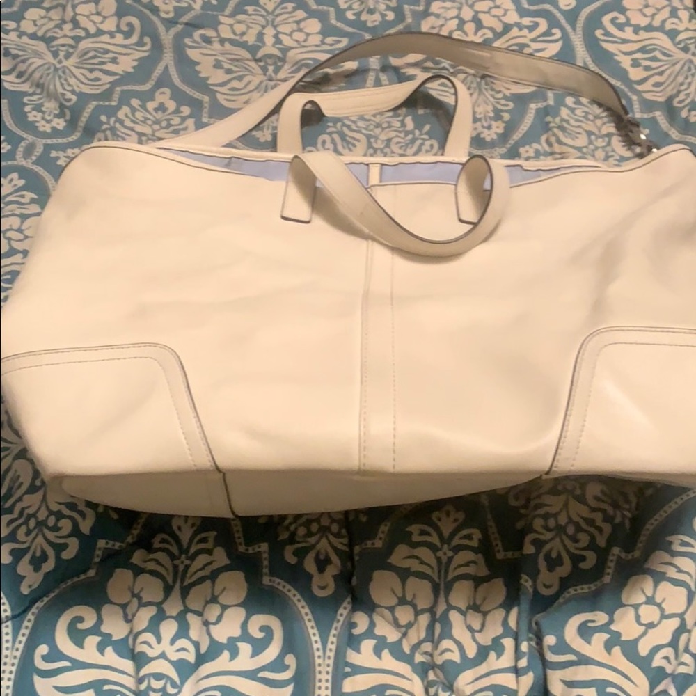 Coach, white leather pocket book with wristlet